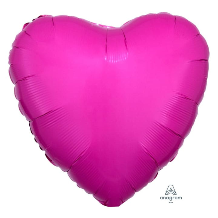 Heart-shaped balloon in bright bubble gum pink color 